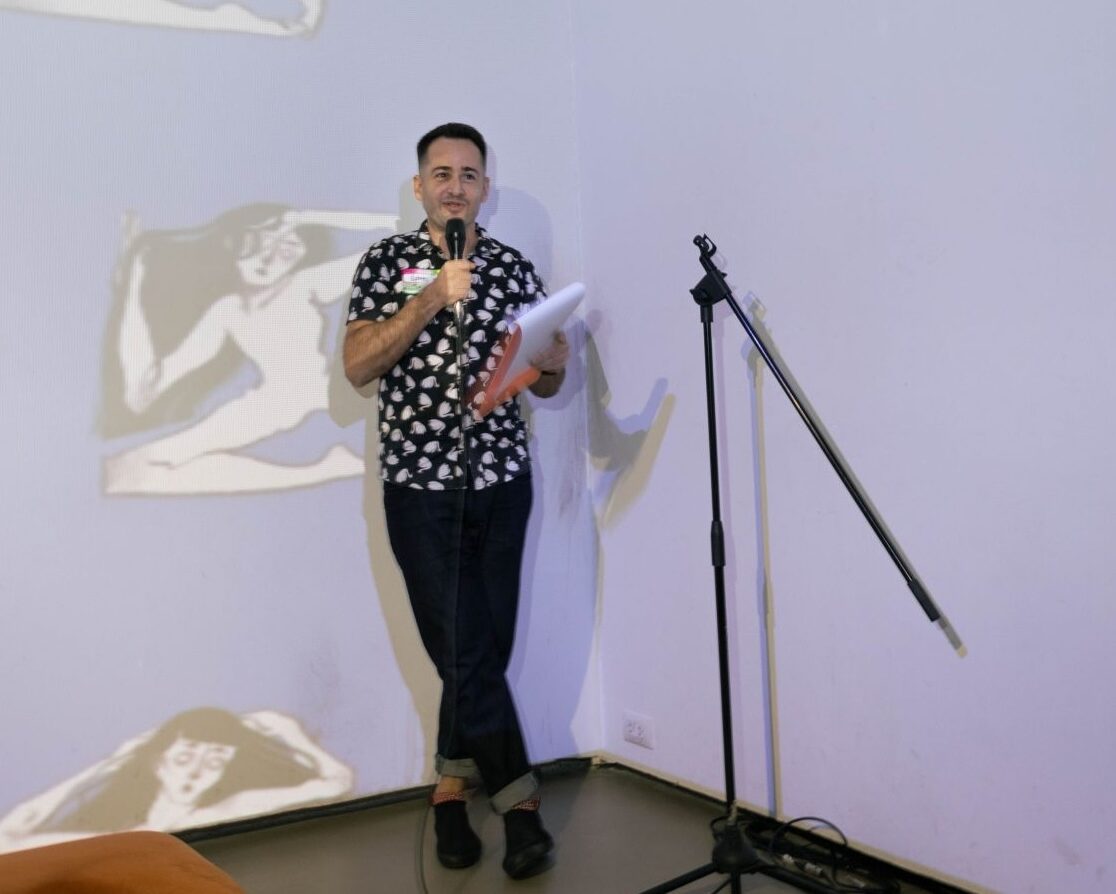 Gabriel facing his students for the reunion speech