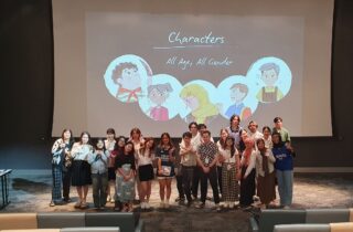 Students in front of a projection screen