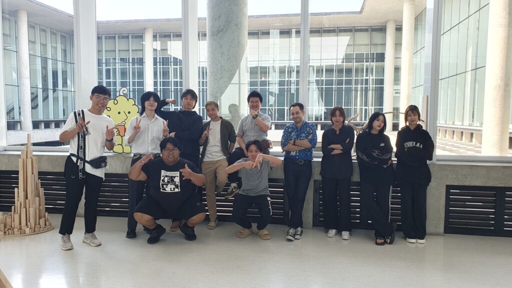 Group photo of Gabriel camelin and his students in MUIC campus