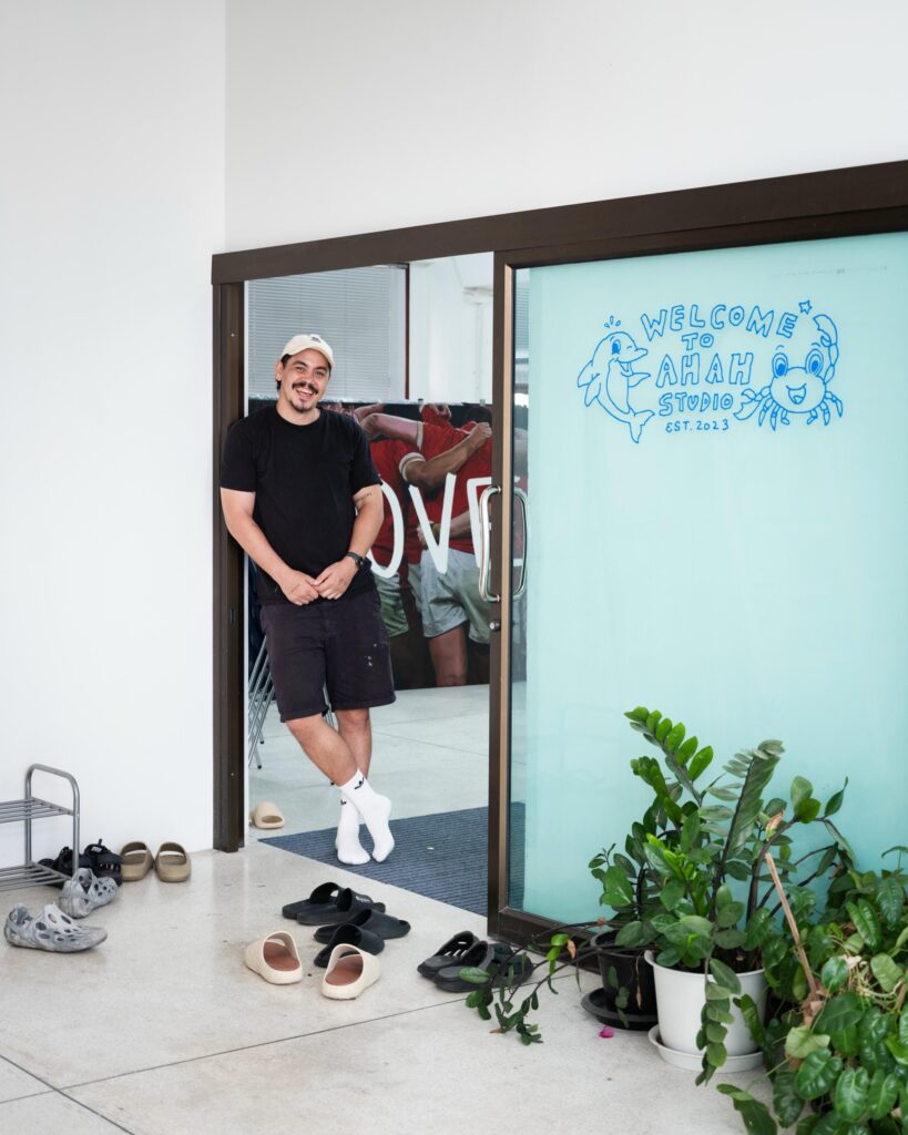 Abdul Abdullah standing in the doorway of Ahah Studio in Bangkok.